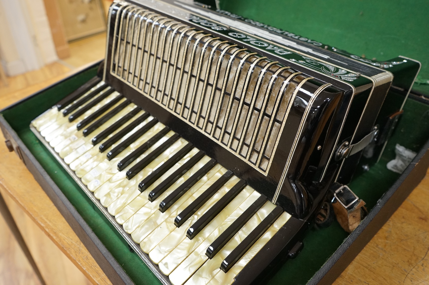 A cased Paolo Soprani Castelfidardo Italia piano accordion.